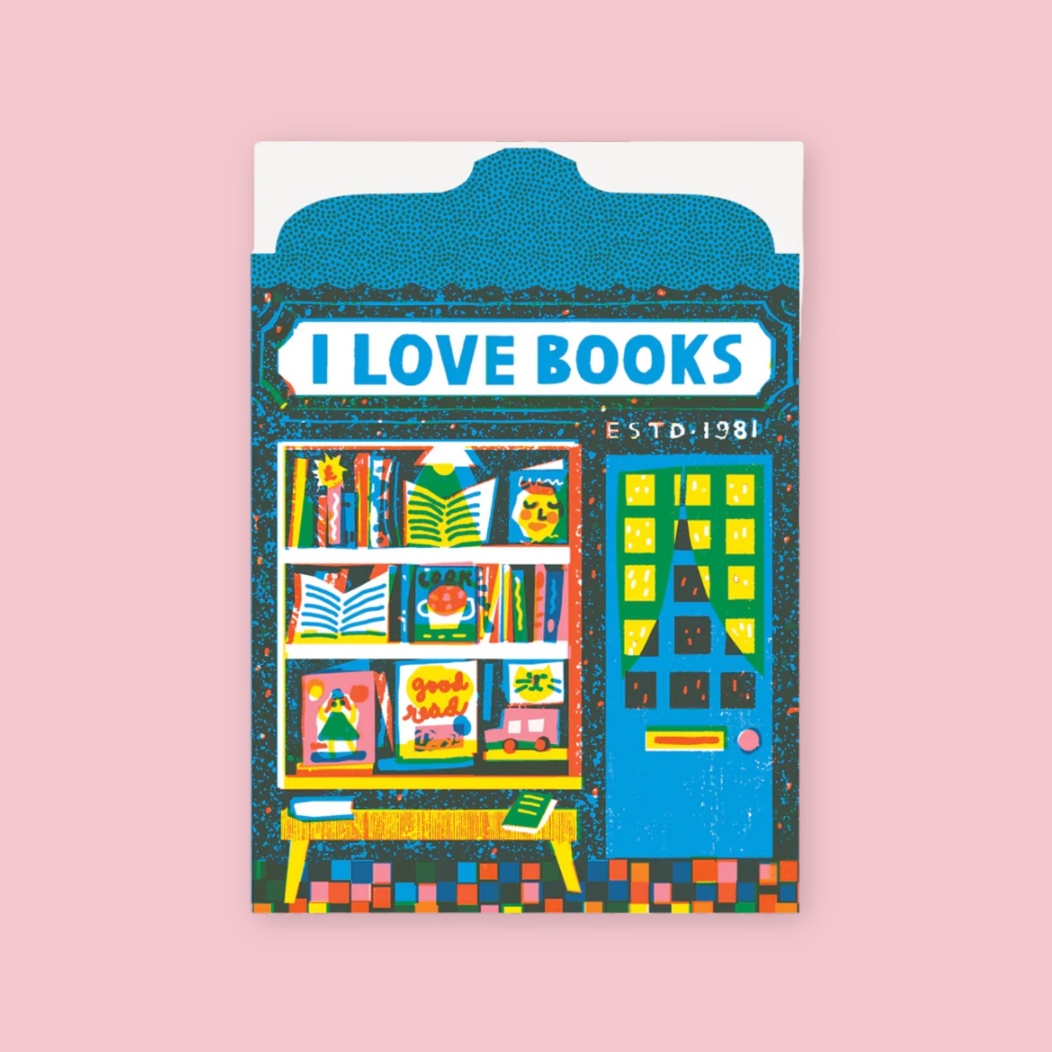 The Printed Peanut die cut greeting card shaped like a blue bookshop storefront with books displayed in the window