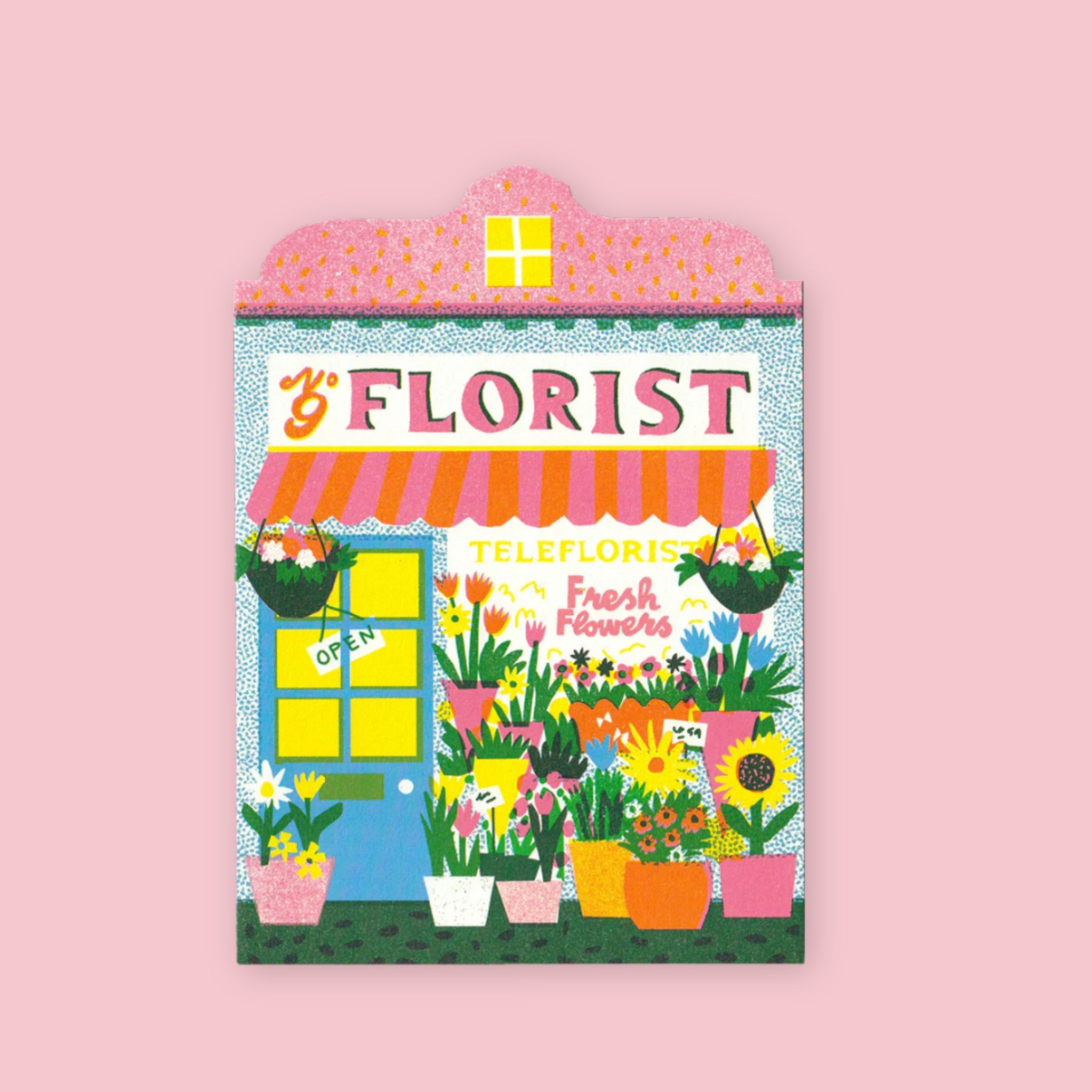 The Printed Peanut die cut greeting card shaped like a florist shop storefront with colorful flowers and plants in the window