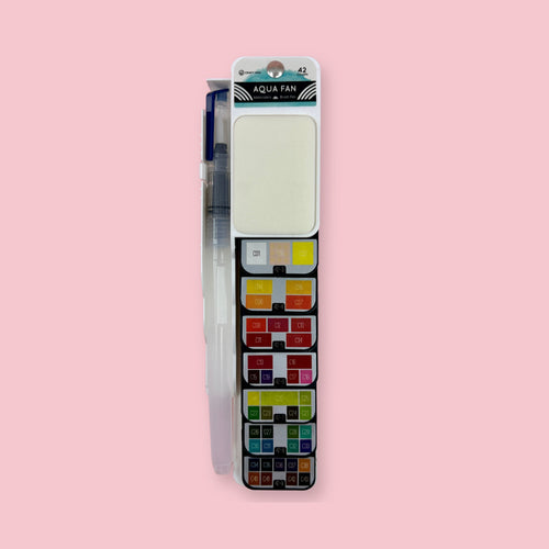 Closed fan-style watercolor palette with water brush, shown against a pink background.