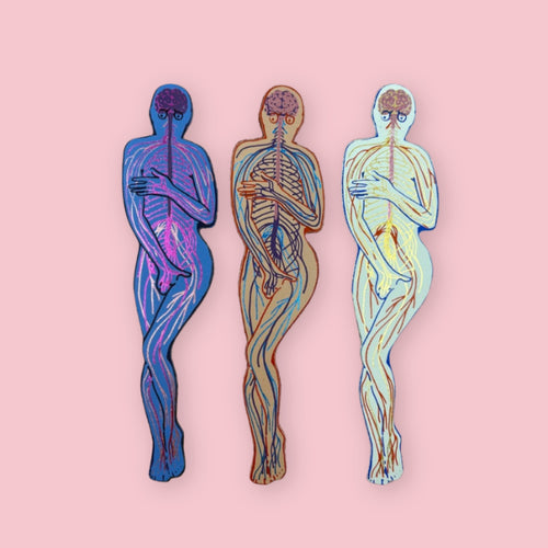 Three leather bookmarks featuring illustrated human nervous system anatomy in blue, blush, and cream designs on a pale pink background.
