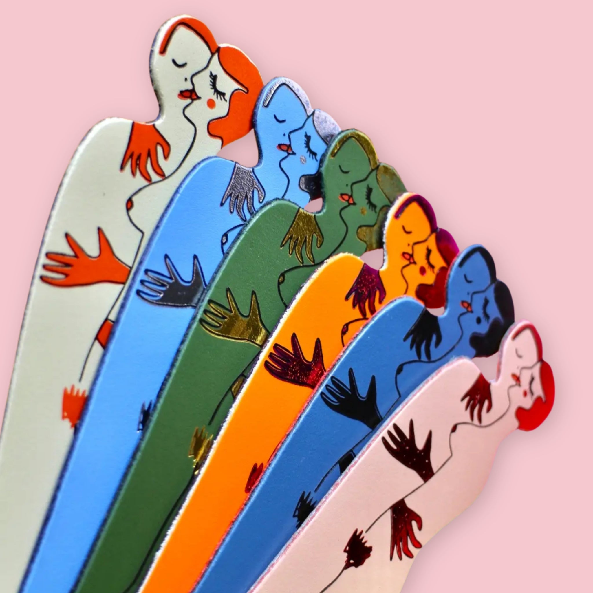 Colorful Ark Colour Design book lover bookmarks with illustrated embracing figures on a pink background