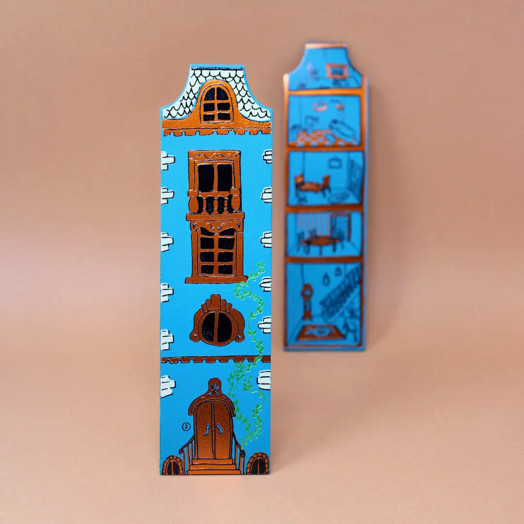 Ark Colour Design blue dollhouse-shaped bookmarks with illustrated doors and windows on a beige background