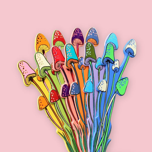 Multicolored mushroom-shaped bookmarks in pink, yellow, orange, red, purple, teal, green, and blue, fanned out like a bouquet on a pink background.