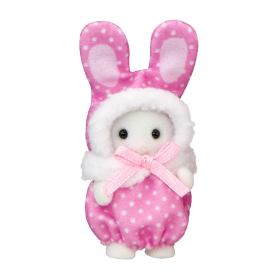 Calico Critters bunny figure wearing a pink polka-dot bunny suit with a white faux-fur hood and matching bow, photographed on a plain white background.
