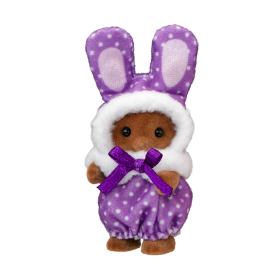 Calico Critters bunny figure wearing a purple polka-dot bunny suit with white faux-fur trim and a purple bow, shown on a plain white background.
