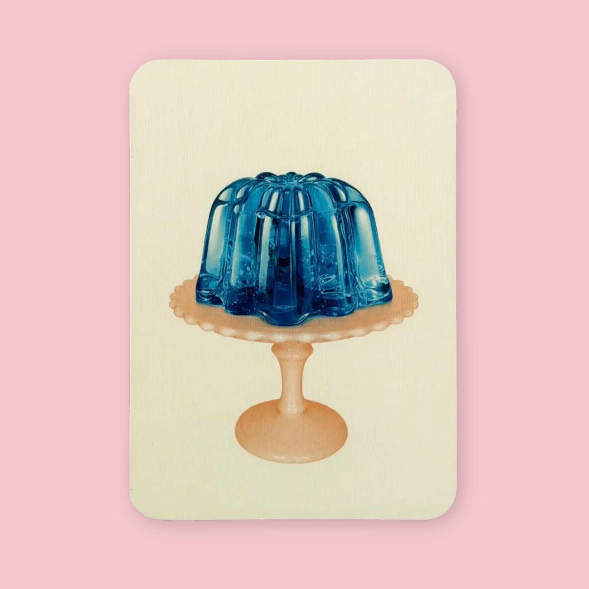 Canonbury Press greeting card featuring blue jelly on a pale orange pedestal plate against a pink background