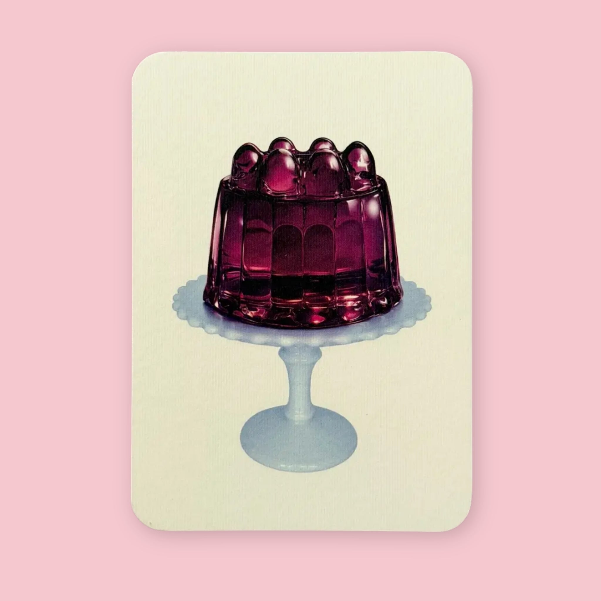 Canonbury Press greeting card featuring purple jelly on a pale blue pedestal plate against a pink background