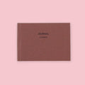 Dark Red Daigo Mini Easy Journal 3 Things with black lettering on a pink background.
