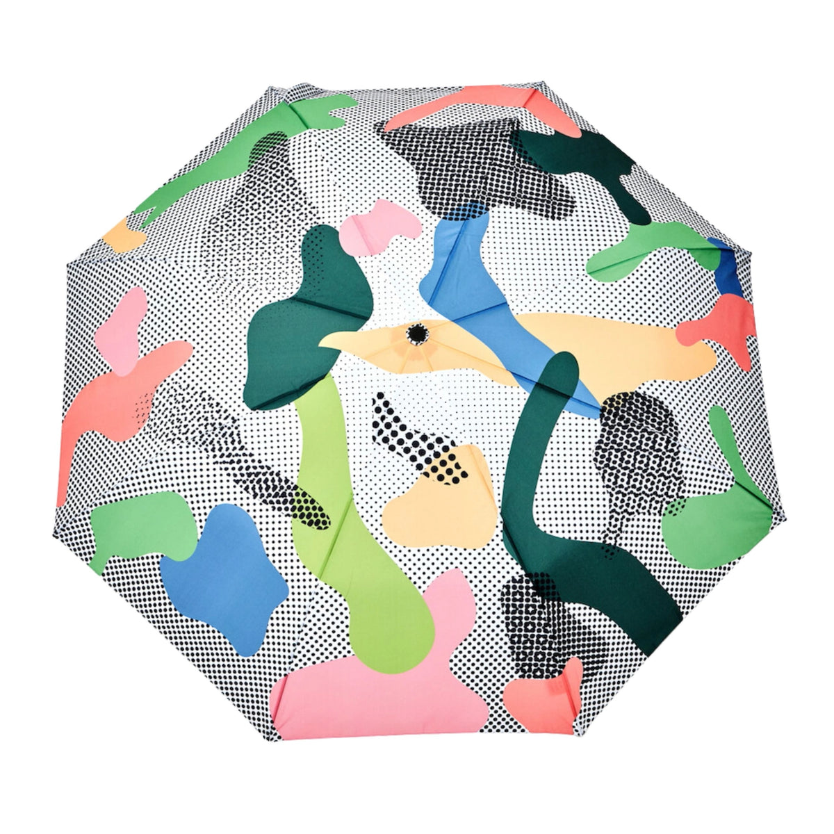 Compact umbrella with colorful abstract shapes and black dotted pattern, shown open on a white background.