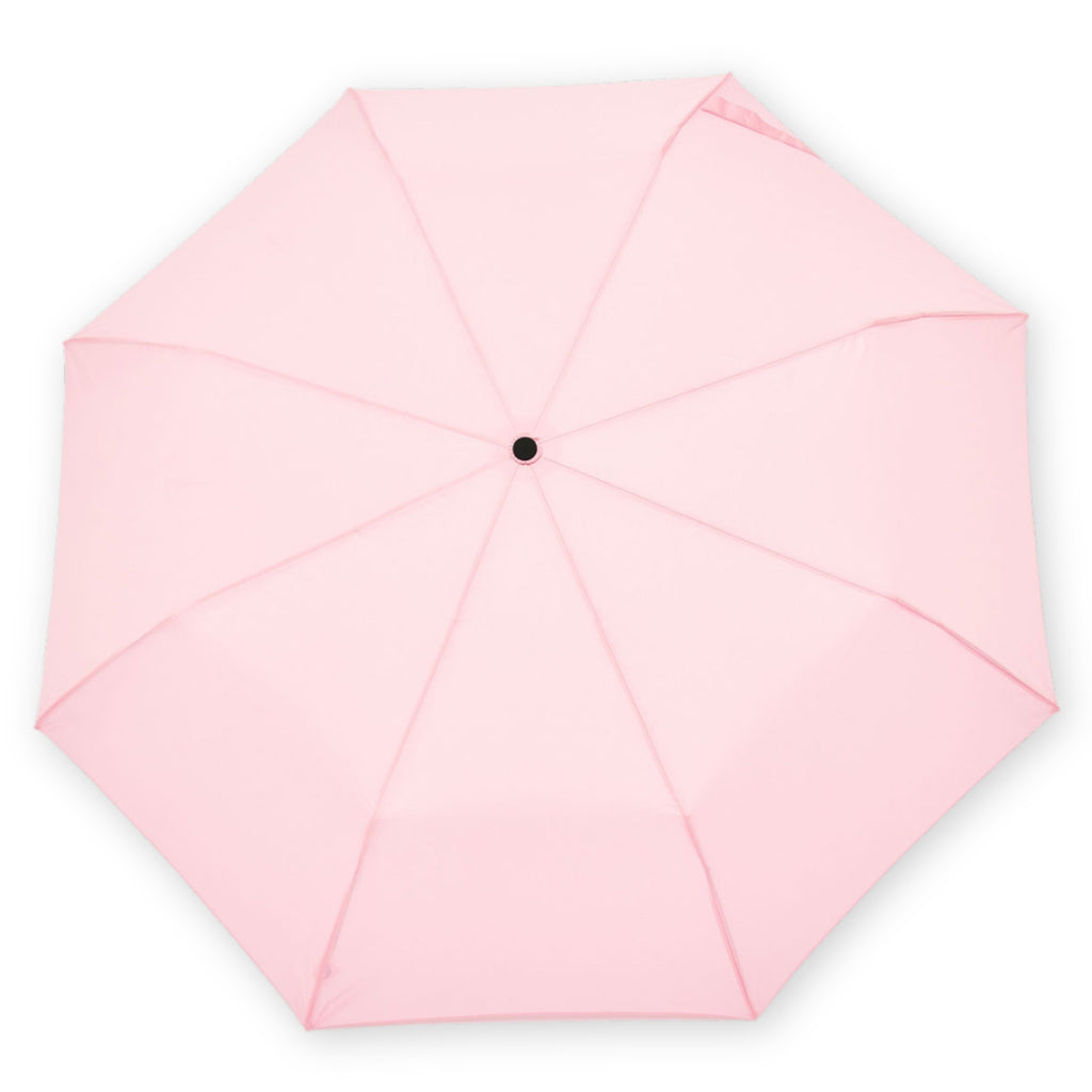 Pink compact umbrella shown open on a white background.