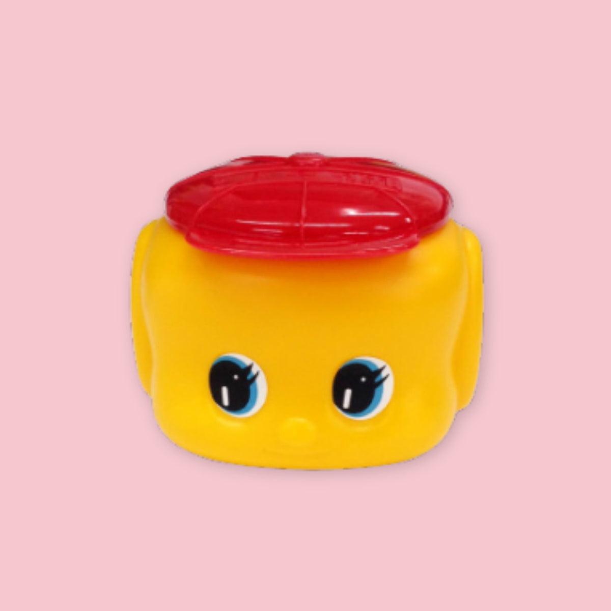Fueki starch glue in a yellow character container with red lid on a pink background.