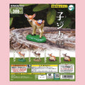 Tarlin fawn figure gachapon featuring four miniature deer designs with flowers, leaves, and woodland bases.