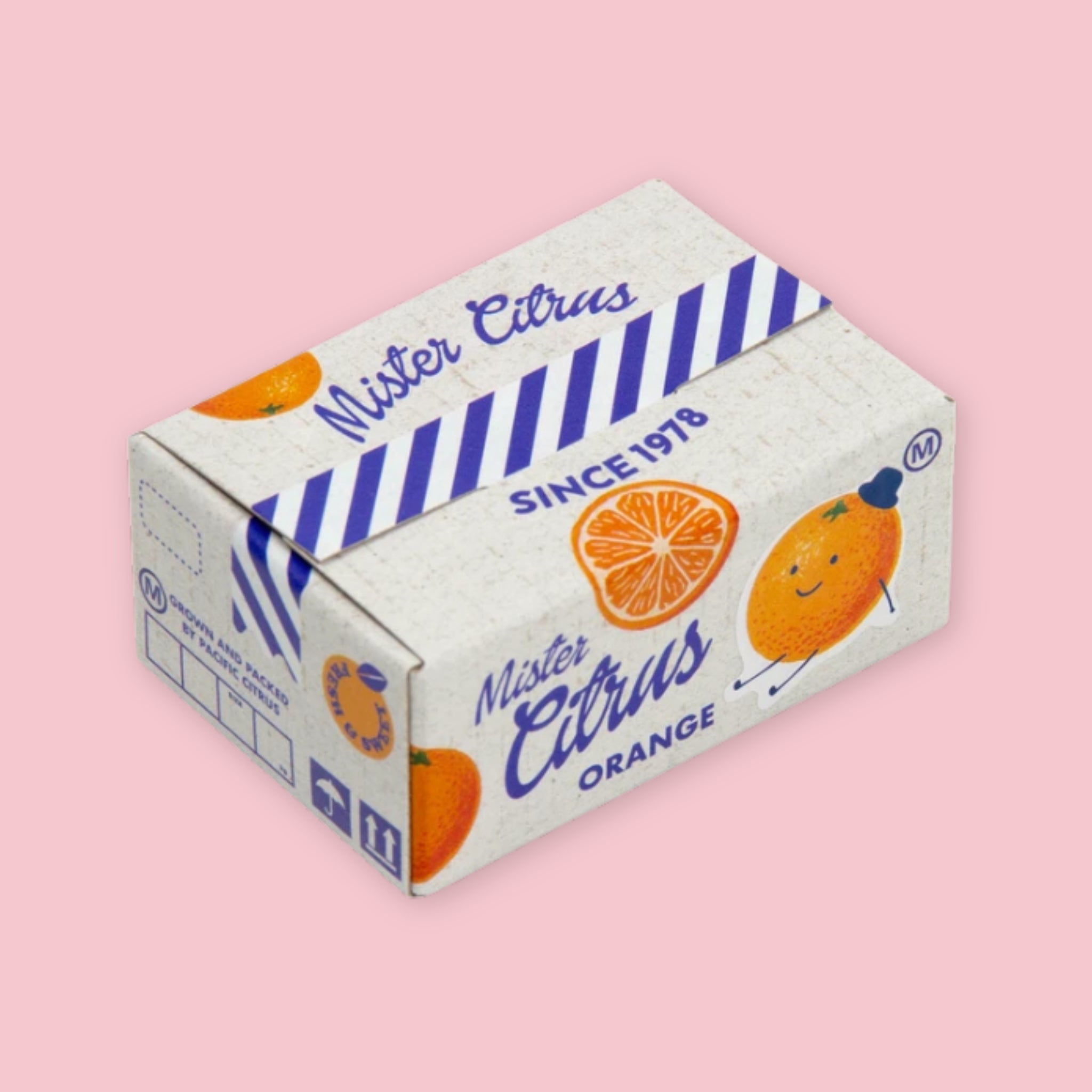 Box of Hako stickers designed to resemble vintage citrus crate packaging, with white and blue stripe graphics, orange illustrations, a smiling orange character, and "Mister Citrus Since 1978" branding, on a pink background.