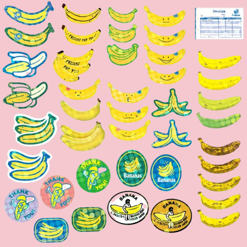 Spread of Bananas Hako seal stickers depicting bananas in various styles and ripeness stages, including smiley-face bananas, bunches, peels, "Present for You" gift bananas, "Thank You" badges, Banana Boat Club Japan circular emblems, and a blue invoice, on a pink background.
