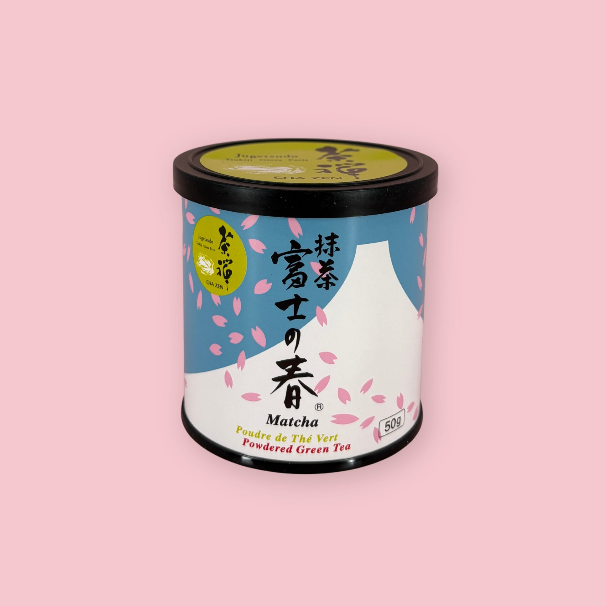 Jugetsudo Matcha Fuji no Ka tin with cherry blossom and Mt. Fuji illustration on a pink background