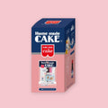 Home Made Cake miniature mascot blind box featuring a Japanese baking-supply charm, shown on a pink background.