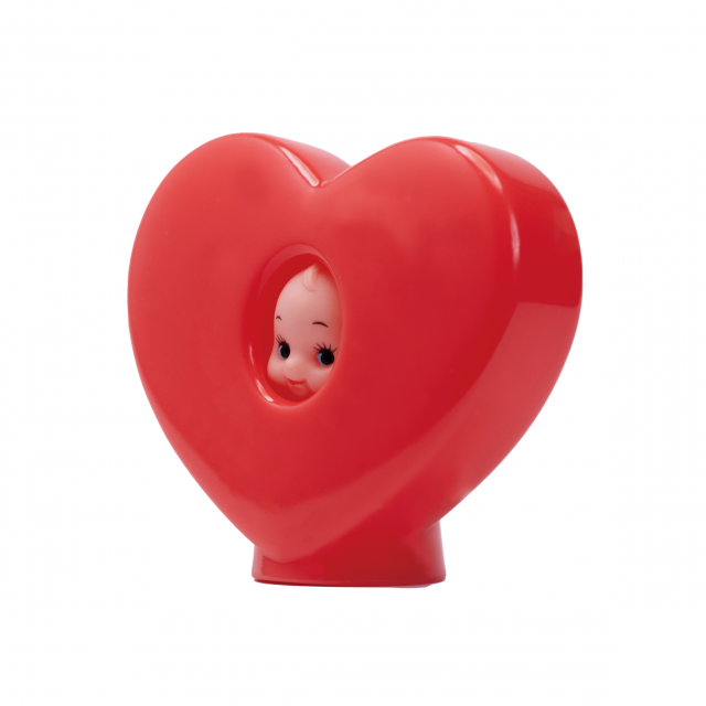 Red heart-shaped Obitsu Kewpie hood doll with Kewpie face peeking through the front opening.