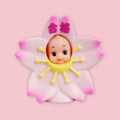 Obitsu Kewpie doll dressed as a cherry blossom, with pink petals and Japanese characters on the top petal.