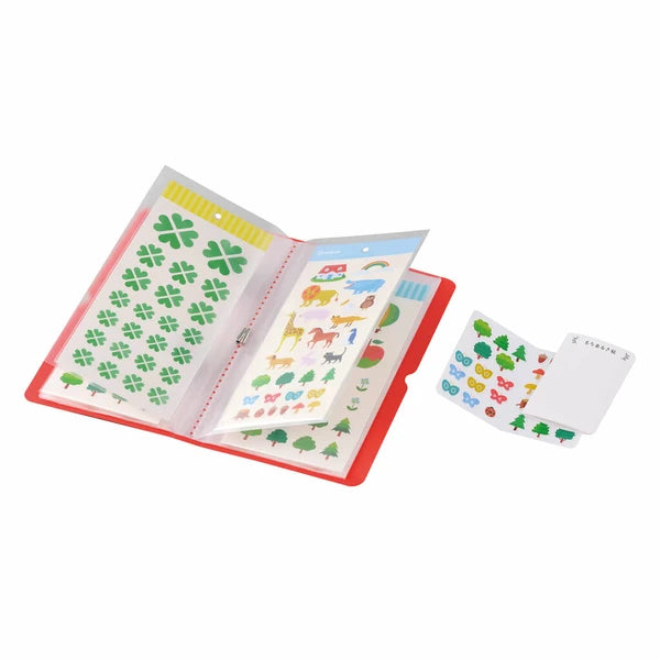 King Jim Otona Sticker Album open showing clear pocket pages storing sticker sheets.