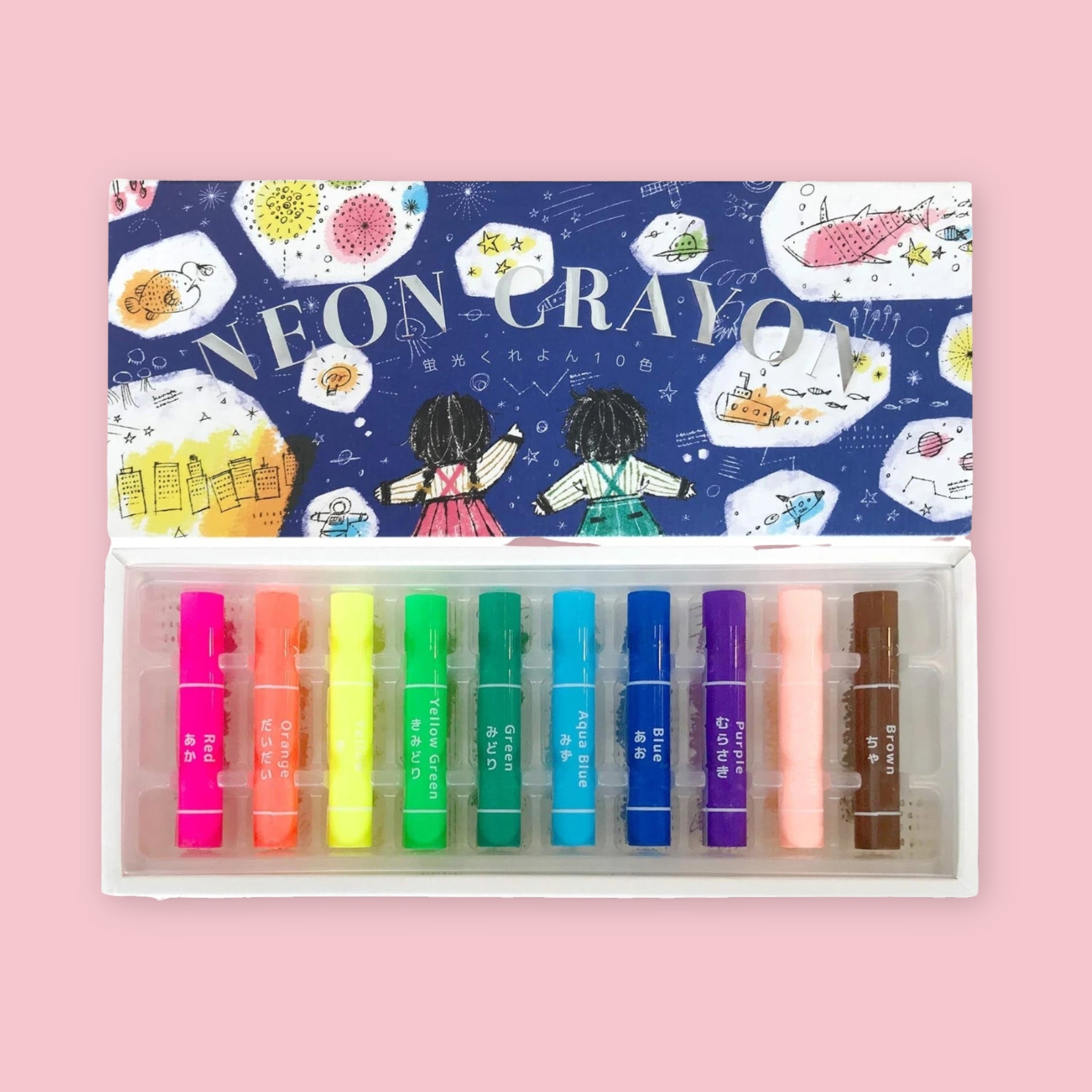 Kokuyo Neon Crayon set of 10 displayed open on a pink background, showing fluorescent crayons in red, orange, yellow, yellow green, green, aqua blue, blue, purple, pale orange, and brown, with navy blue box lid illustrated with a girl in a hanbok surrounded by glowing doodles of fish, rockets, and fireworks