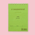 Green Life Stenographers' Notebook with spiral binding, labeled "Gregg 50 Sheets" with book number and date fields, against a pink background