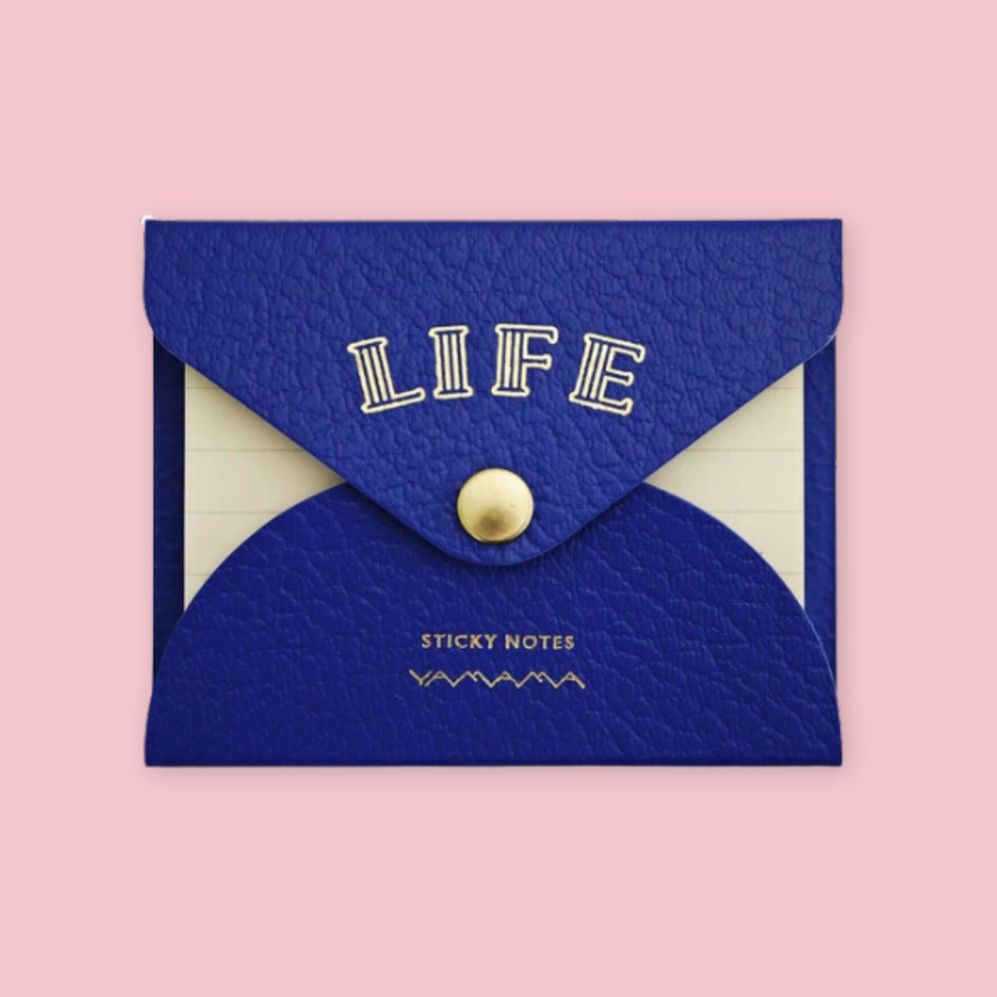 Royal blue faux leather envelope pouch embossed with "LIFE" sticky notes, snap closure, on a pink background.