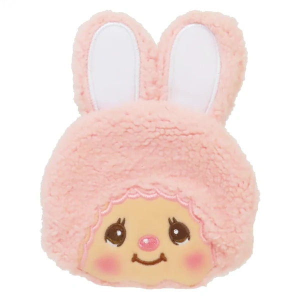 Monchhichi bunny plush coin purse with pink fluffy fur, tall bunny ears, smiling face, and rosy cheeks on a white background.