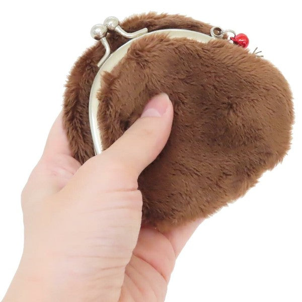 Monchhichi plush coin purse shown from the back, with brown fur, silver clasp, and red charm on a white background.