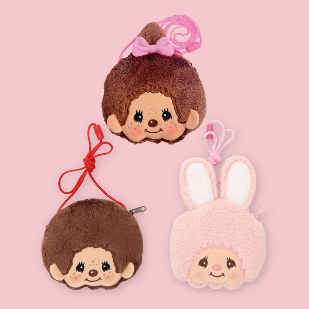 Three Monchhichi plush neck pouches, including Chimutan bunny and Monchhichi styles, shown on a pink background with red and pink shoulder cords.