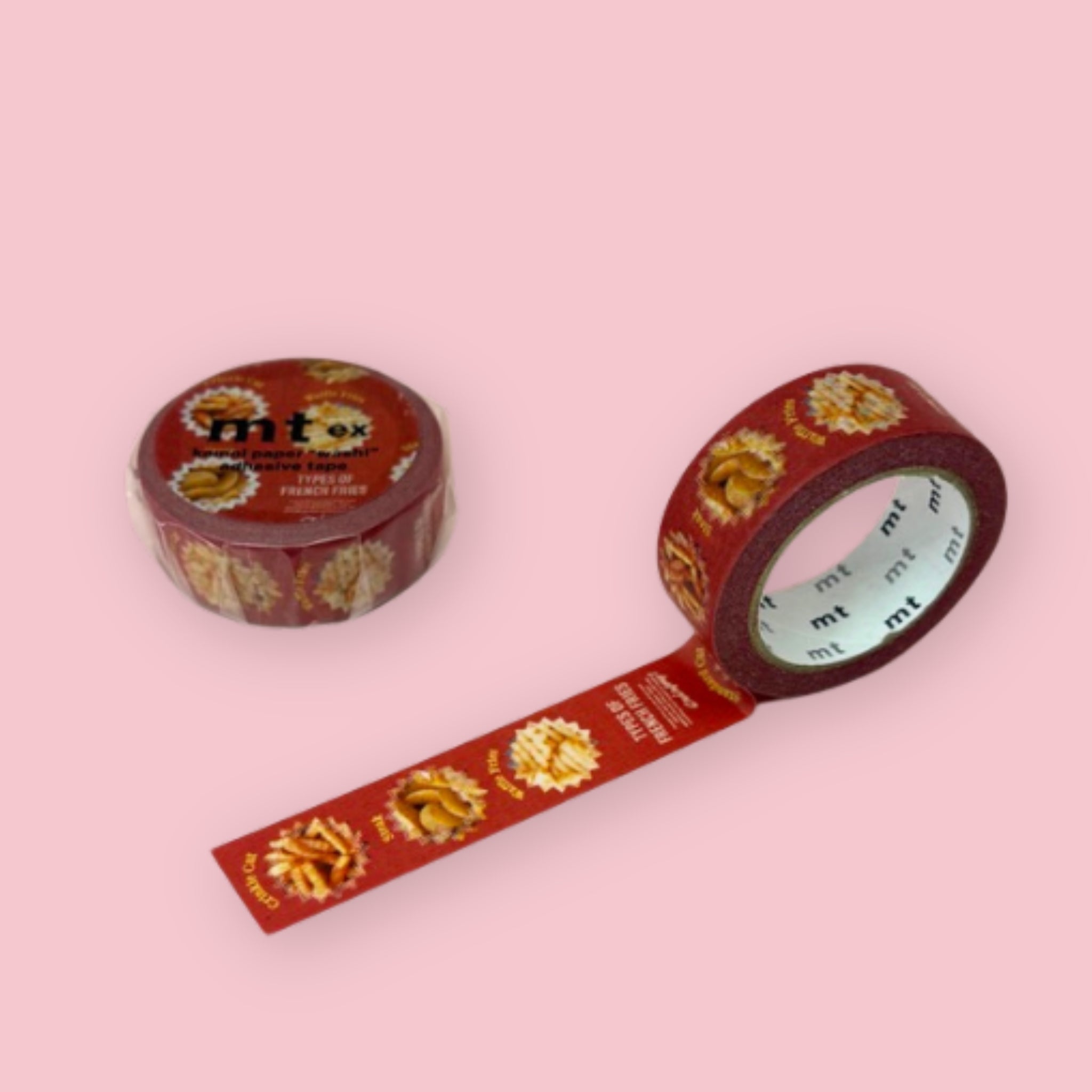 Red mt washi tape with a French fries pattern, shown partly unspooled beside a wrapped roll on a pink background.