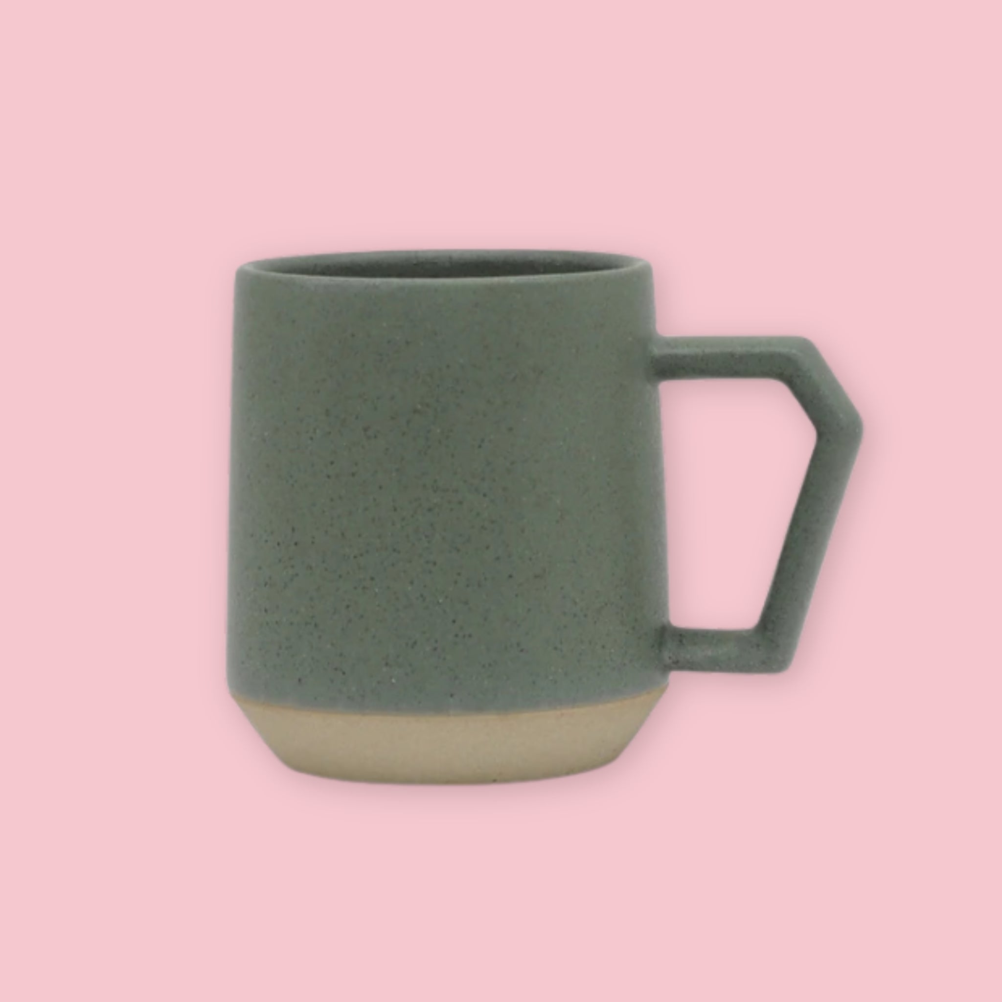 Chips Mug in Khaki Green with matte speckled glaze and exposed terracotta base on a pink background