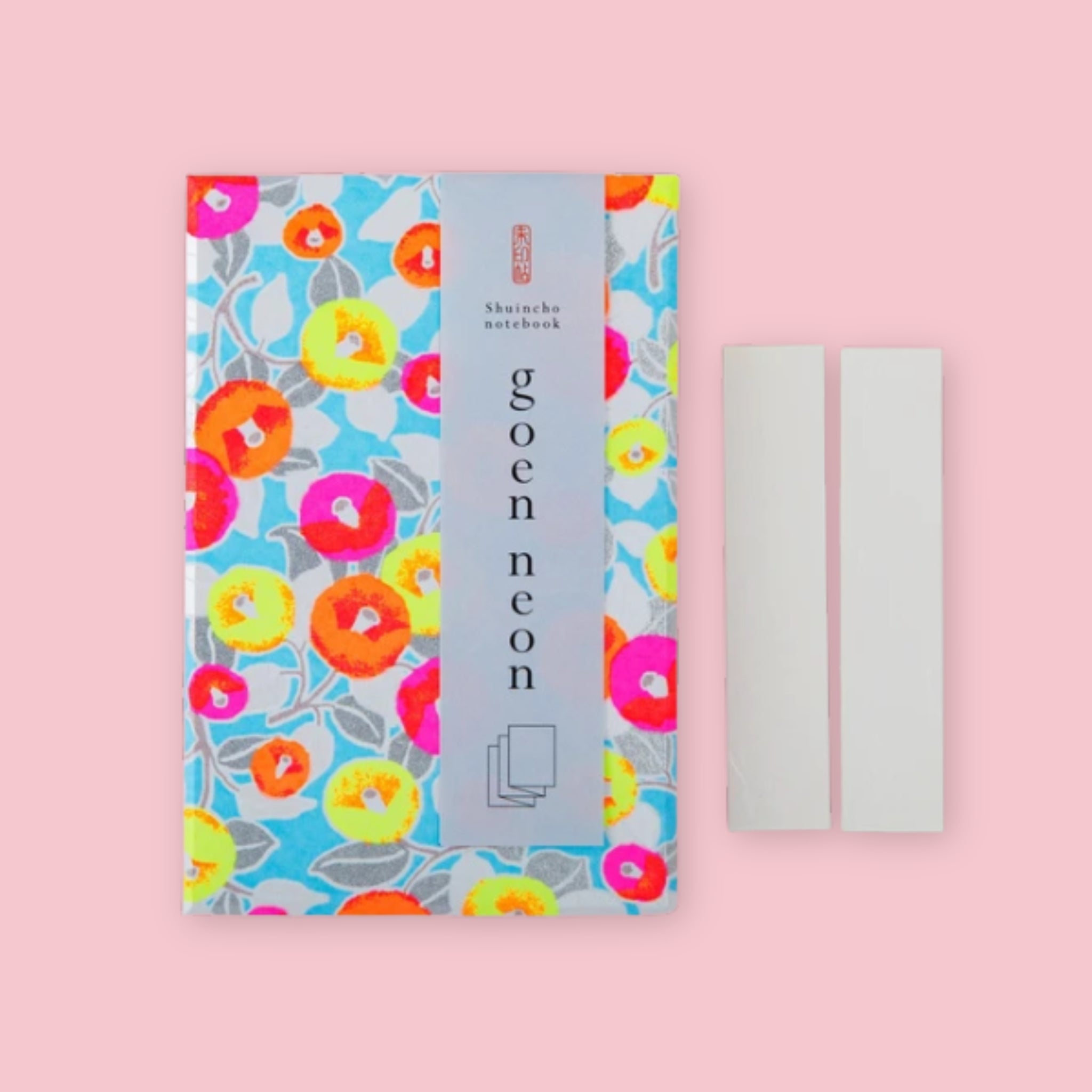 Shogado Goen Neon Japanese stamp book with neon blue camellia yuzen washi paper cover, shown with title stickers, Made in Japan