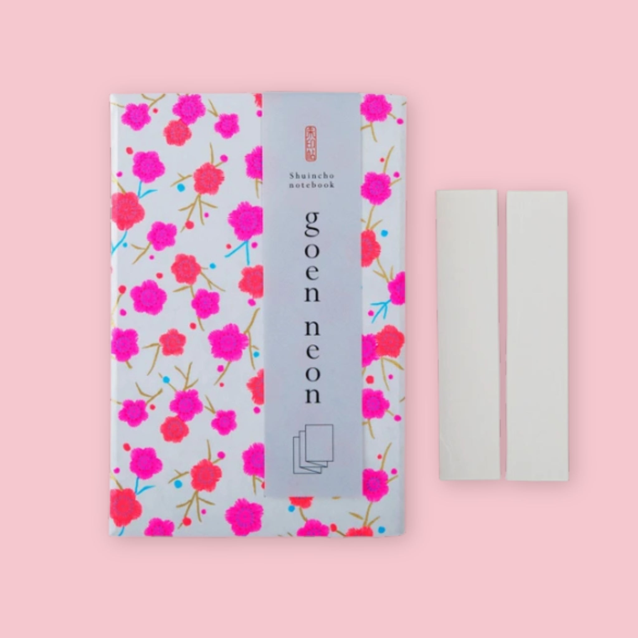 Shogado Goen Neon Japanese stamp book with neon pink plum yuzen washi paper cover, shown with title stickers, Made in Japan