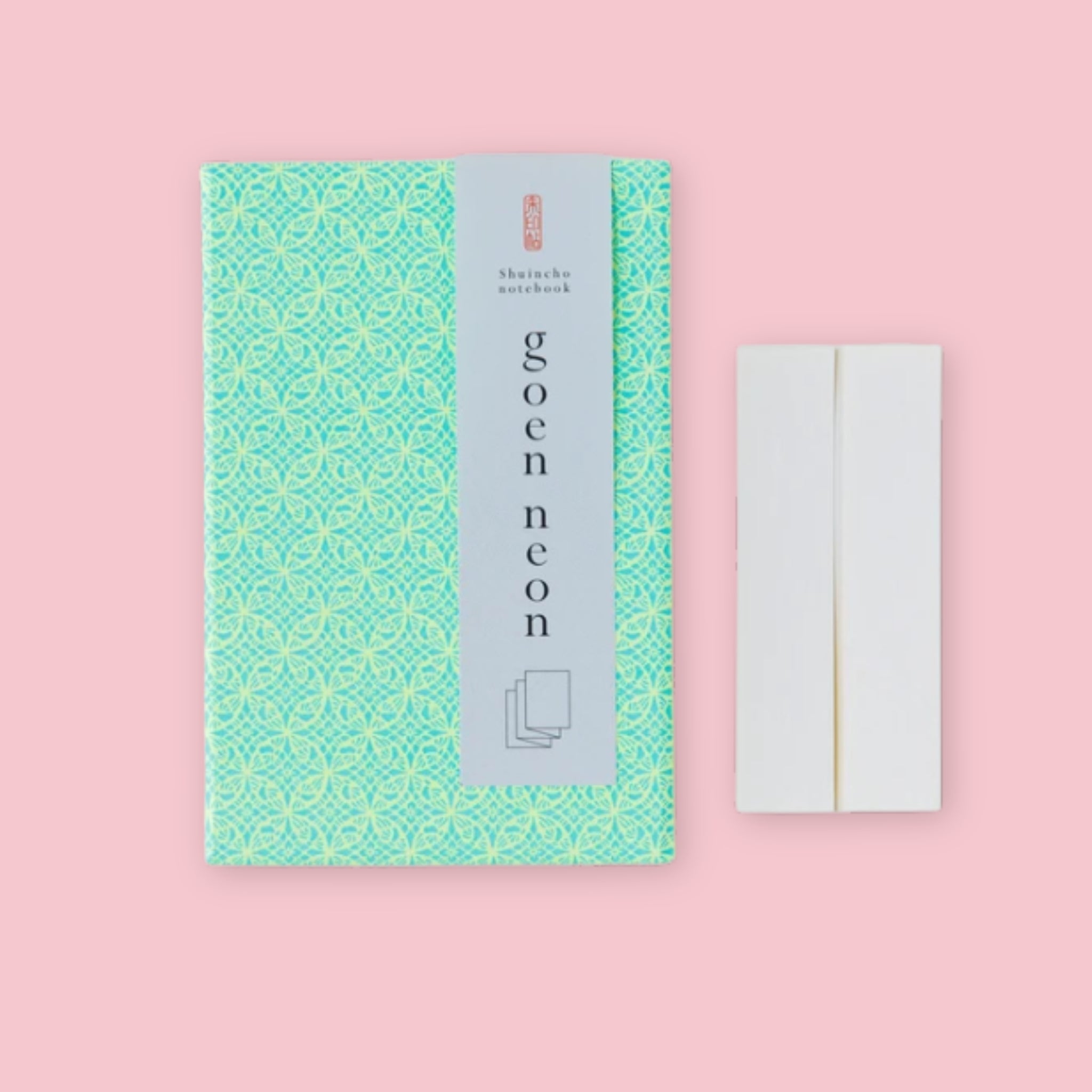 Shogado Goen Neon Japanese stamp book with neon teal geometric yuzen washi paper cover, shown with title stickers, Made in Japan