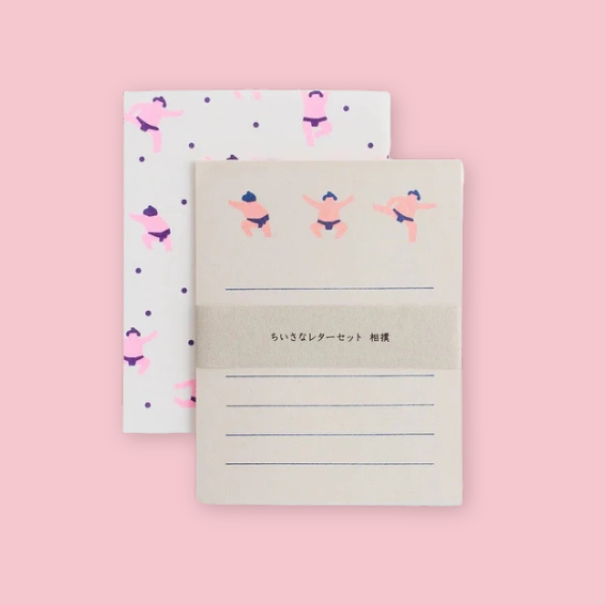 Mizushima Sumo letter writing set showing white and coarse paper sheets with neon sumo wrestler illustrations on a pink background