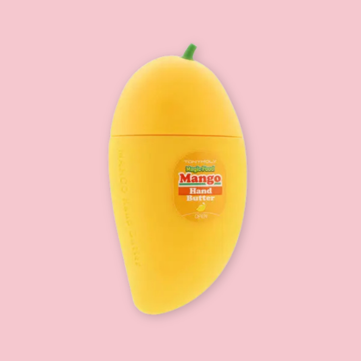Mango Hand Butter in a bright yellow mango-shaped container on a soft pink background.