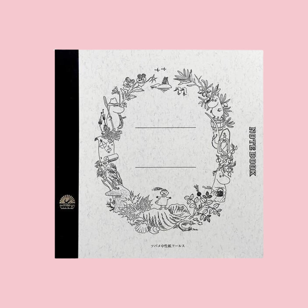 Square Tsubame notebook featuring Moomin illustrations, with a textured white cover, black spine, and detailed woodland wreath border surrounding blank label lines in the center. The monochrome artwork includes Moomin characters, plants, and nature scenes.