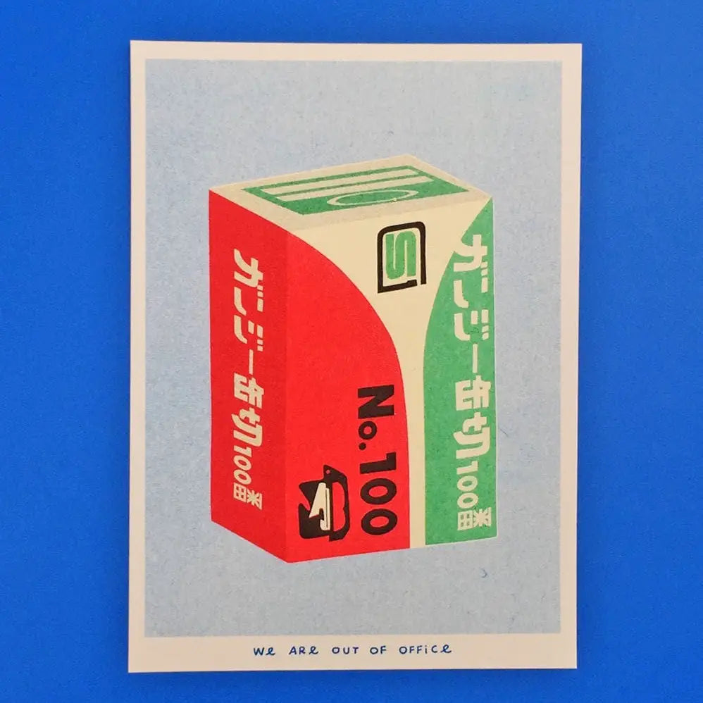 We Are Out of Office risograph art print featuring a Japanese can opener box illustration, photographed on a blue background.